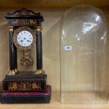 A lovely inlaid regency Portico clock under dome by Mesnier Fils Paris with glass dome and base,