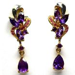 A pair of 925 silver gilt earrings set with marquise and pear cut amethysts and rodolite garnets, L.
