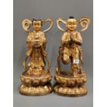A pair of large Sino-Tibetan gilt bronze figures of Buddhist angels, H. 46cm.