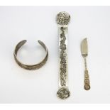 A Chinese silver butter knife together with a white metal ruyi and silvered copper bangle.