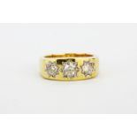 A heavy gentleman's 9ct yellow gold three stone diamond ring, total approx. 1ct, (R).