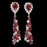 A pair of 925 silver rose gold gilt drop earrings set with rubies and whtie stones, L. 4.1cm.