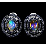 A pair of 925 silver cluster earrings set with cabochon cut opal and two rows of sapphires, L. 2.
