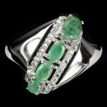 A 925 silver corssover ring set with oval cut emeralds and white stones, (S).