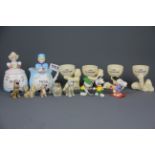 A small group of mixed items including Wade figures and Snoopy figures.