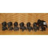 An extensive family of Victorian spelter elephants with one ebony elephant, largest 17 x 9cm.