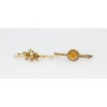 An antique 15ct gold brooch set with seed pearls together with a hallmarked 9ct gold brooch set with