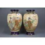 A pair of early 20th C. Japanese satsuma vases, H. 30cm.