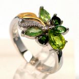 A matching 925 silver ring set with marquise and pear cut peridots and chrome diopsides, (Q).