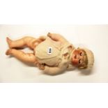 An original Heubach Koppel porcelain headed child doll L.47cm.