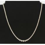 An 18ct white gold (stamped 18k) necklace set with brilliant cut diamonds, approx. 6ct overall,