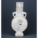 An interesting Chinese carved white jade/ hardstone archaic form urn with phoenix head handles, H.