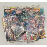 A quantity of Marvel comics and posters.