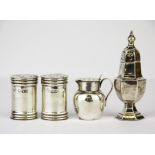 A group of four hallmarked silver pounce and pepper pots, tallest 8cm.