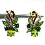 A pair of 925 silver earrings set with marquise and pear cut peridots and chrome diopsides, L. 2cm.