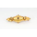 An antique hallmarked 9ct rose gold brooch set with a rose cut diamond, approx. L. 4.2cm.