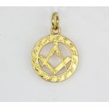 A hallmarked 15ct yellow gold Masonic pendant, approx. L. 2.6cm.