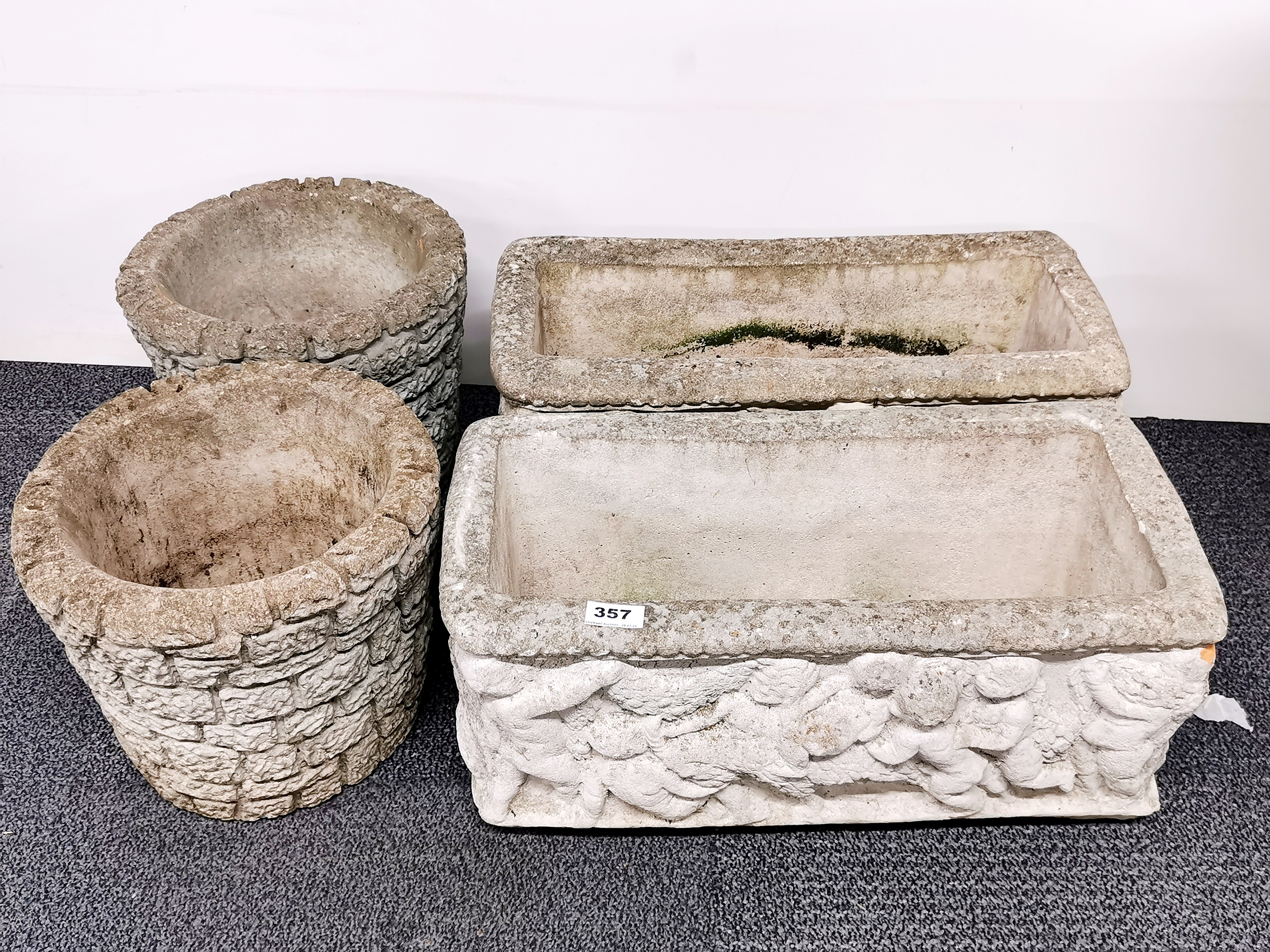 Four vintage concrete garden planters, largest 53 x 25 x 25.