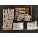 A quantity of mixed stamps, tea cards, etc.