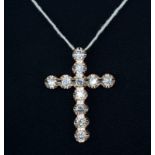 A 9ct rose gold (stamped 9k) cross pendant set with brilliant cut diamonds, approx. 3.36ct