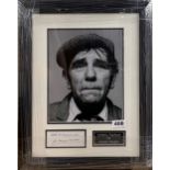 Autograph interest: An autograph of Sir Norman Wisdom with a photograph of the comedian. , 35 x