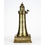 An interesting hallmarked silver lighthouse table lighter, H. 18cm. With spare flints.