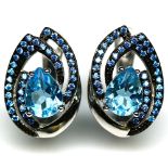 A pair of 925 silver earrings set with pear cut blue topaz, L. 1.8cm.