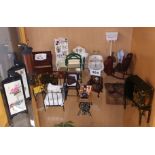 A quantity of good quality dolls house antique style furniture items.