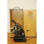 A boxed Gillett and Sibert microscope.