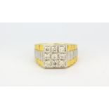 A gentleman's 9ct yellow and white gold (stamped 9k) Rolex design ring set with brilliant cut