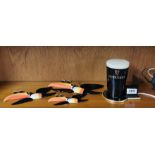 A set of three Carltonware Guinness advertising flying toucans and a Guinness bar light.