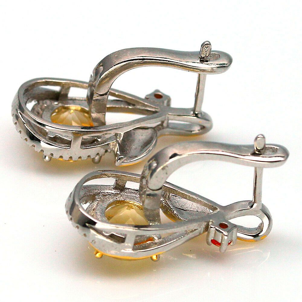 A pair of 925 silver gilt earrings set with round cut citrines and fancy orange sapphires, L. 2. - Image 2 of 2