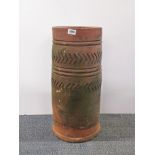 An antique terracota chimney pot, H. 61cm.