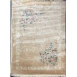 A large cream browned Chininese washed wool carpet, 250 x 350cm.