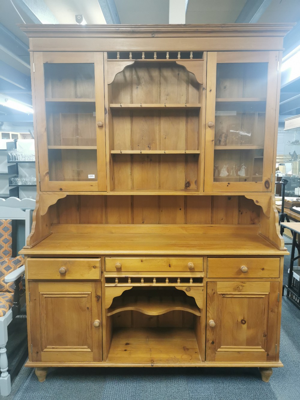 A glazed pine kitchen dresser, 210 x 151 x 44cm.