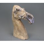 A Han Dynasty (202 BC- 220 AD) type model of a camel's head with remnants of pigment, H. 25cm.