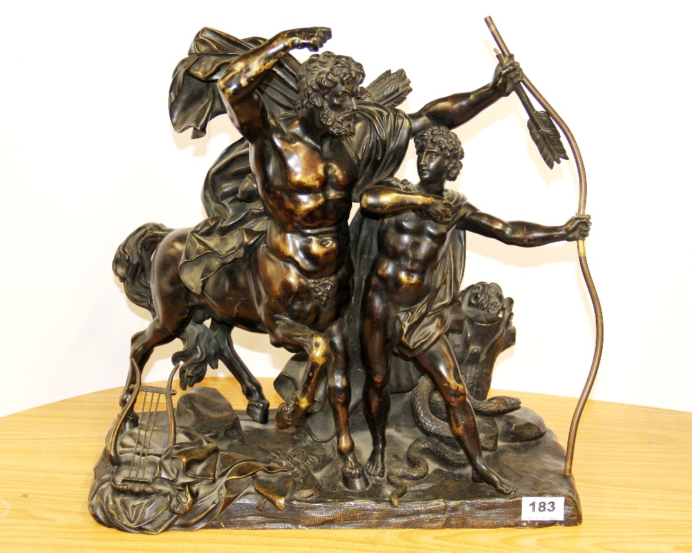 A large early 20th C. bronze figure of a Centaur with Apollo (A/F to arrow head), H. 44cm.