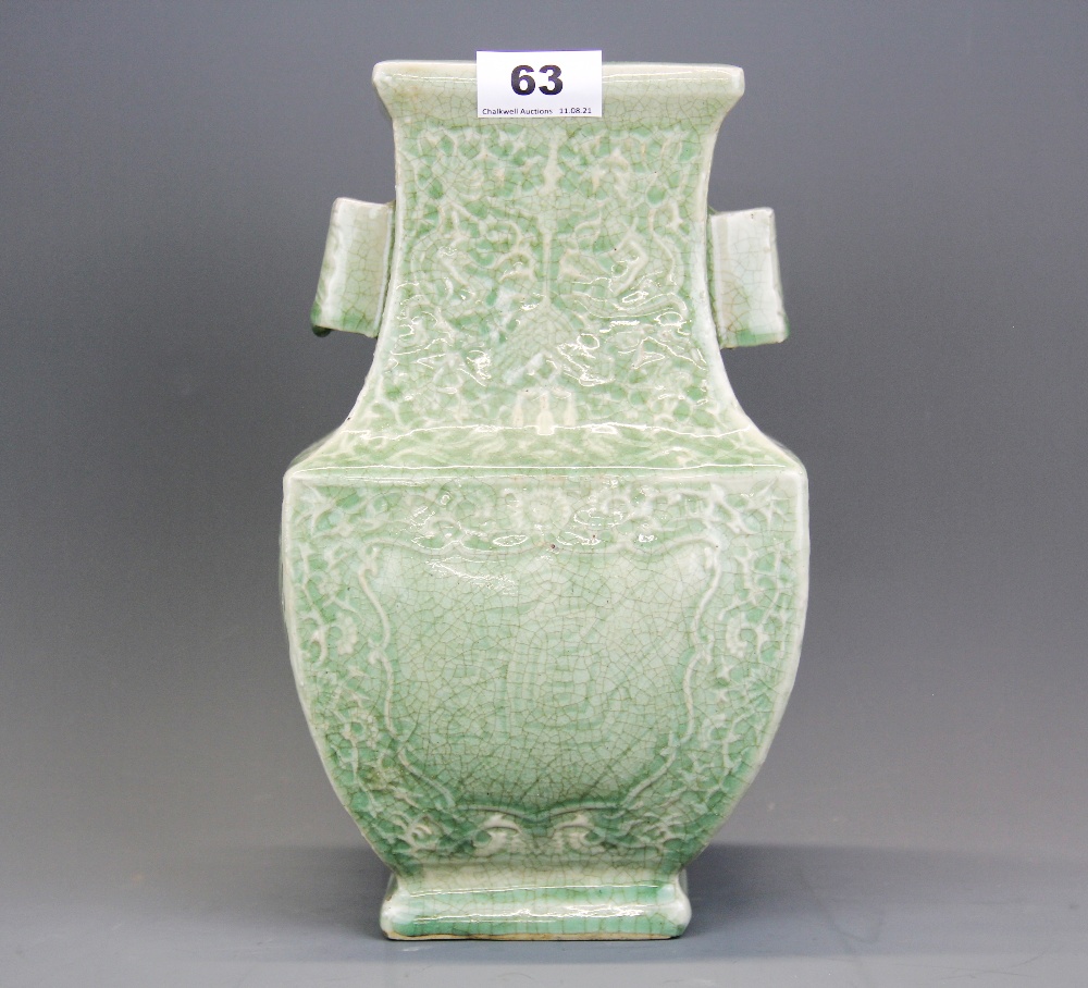 An impressive Chinese celadon green crackle glazed oblong form vase with two rectangular handles and