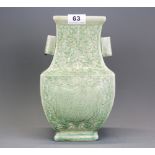 An impressive Chinese celadon green crackle glazed oblong form vase with two rectangular handles and