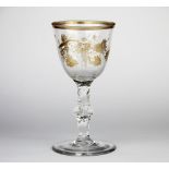 A very fine 18th C gilt cut crystal wine glass, H. 18cm.