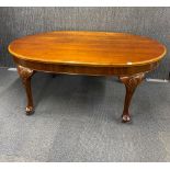 A 1920's oval mahogany dining table, L. 186cm H. 75cm.