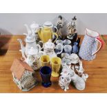 A group of porcelain, coffee pots and other items.