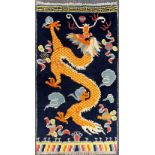 A soft wool Tibetan nomadic dragon rug, 150 x 82cm.