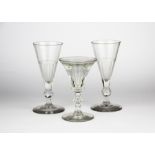 A pair of early cut crystal sherry flutes, H. 15cm. With a further early "illusion" glass.