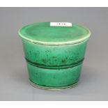 A Chinese green glazed porcelain salt box, Dia. 12cm. H. 9cm.