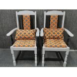 A pair of 1920's re-upholstered and re-finished hall chairs.