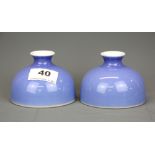 A pair of Chinese pale blue glazed porcelain brush washing bowls, H. 6cm. Dia. 9cm.