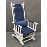 An American re-upholstered and re-finished rocking chair, H. 111cm.