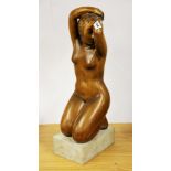 A carved hardwood figure of a female nude with a separate white marble base, overall H. 59cm.