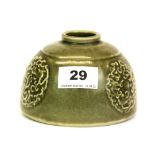 A Chinese olive green glazed porcelain brush washing bowl, Dia. 12cm. H. 8cm.